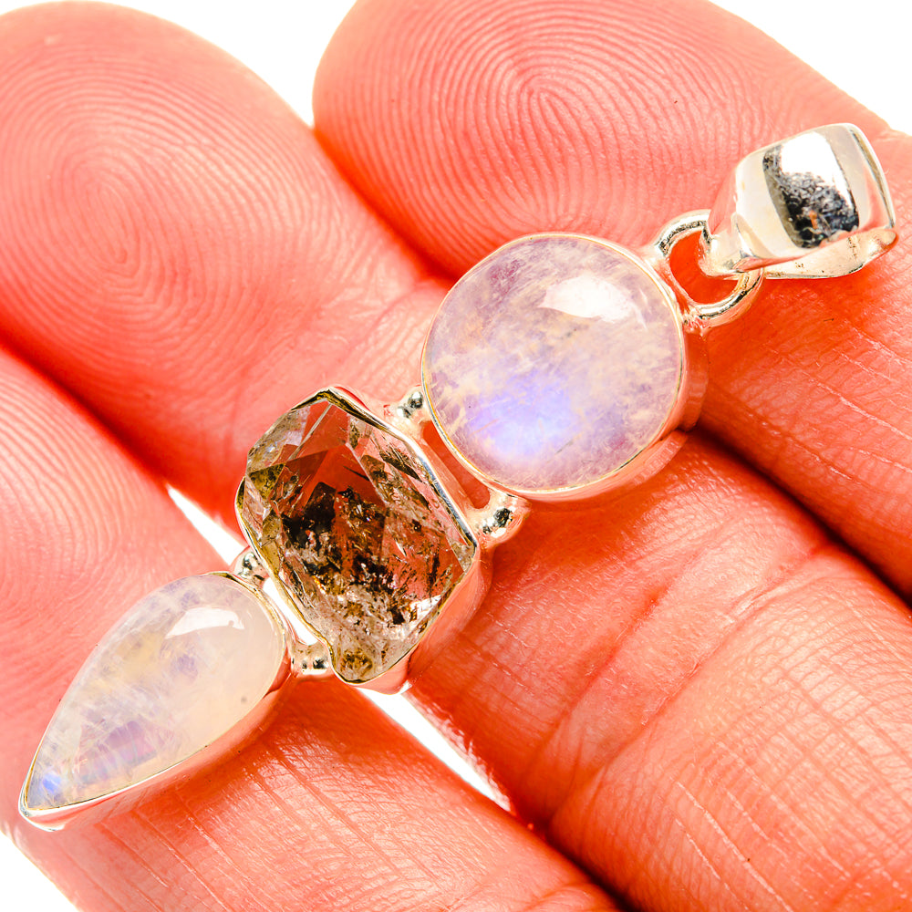 925 sterling silver pendant with iridescent moonstone and gold-toned crystal cluster