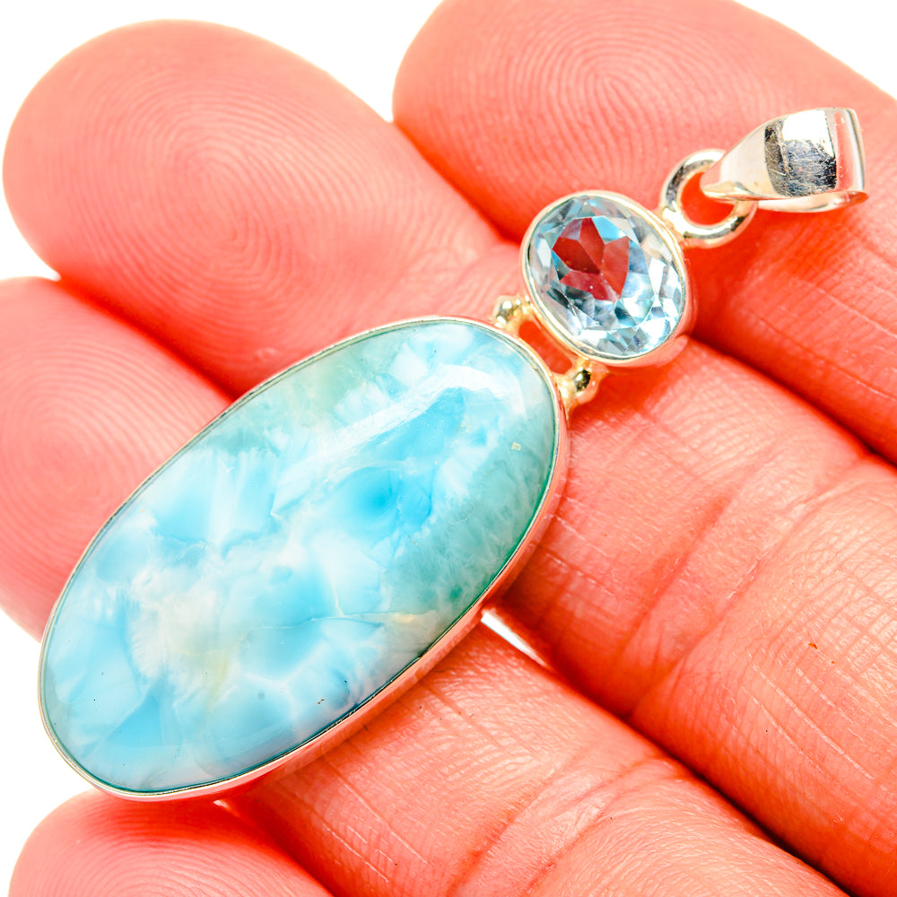Blue topaz and larimar oval pendant close-up, 925 sterling silver with gold-tone links