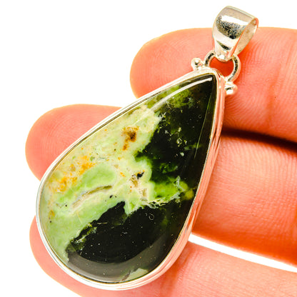 Green opal teardrop pendant close-up on 925 sterling silver bail and frame setting
