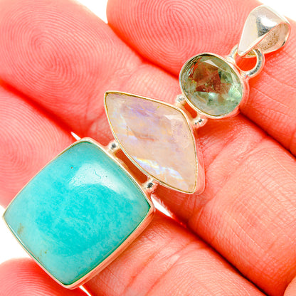 925 silver pendant with turquoise rectangle, iridescent shield, and green round charm
