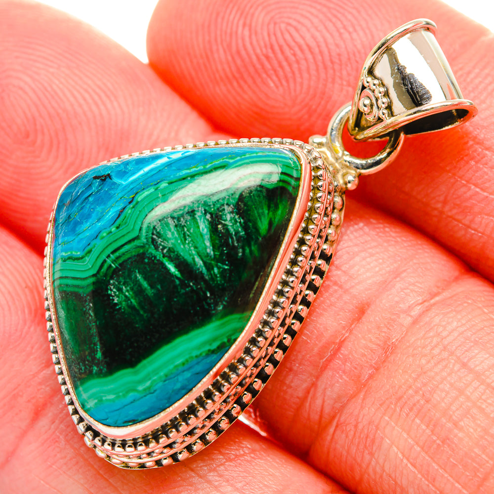 Teardrop malachite-chrysocolla pendant with silver filigree bezel and loop bail