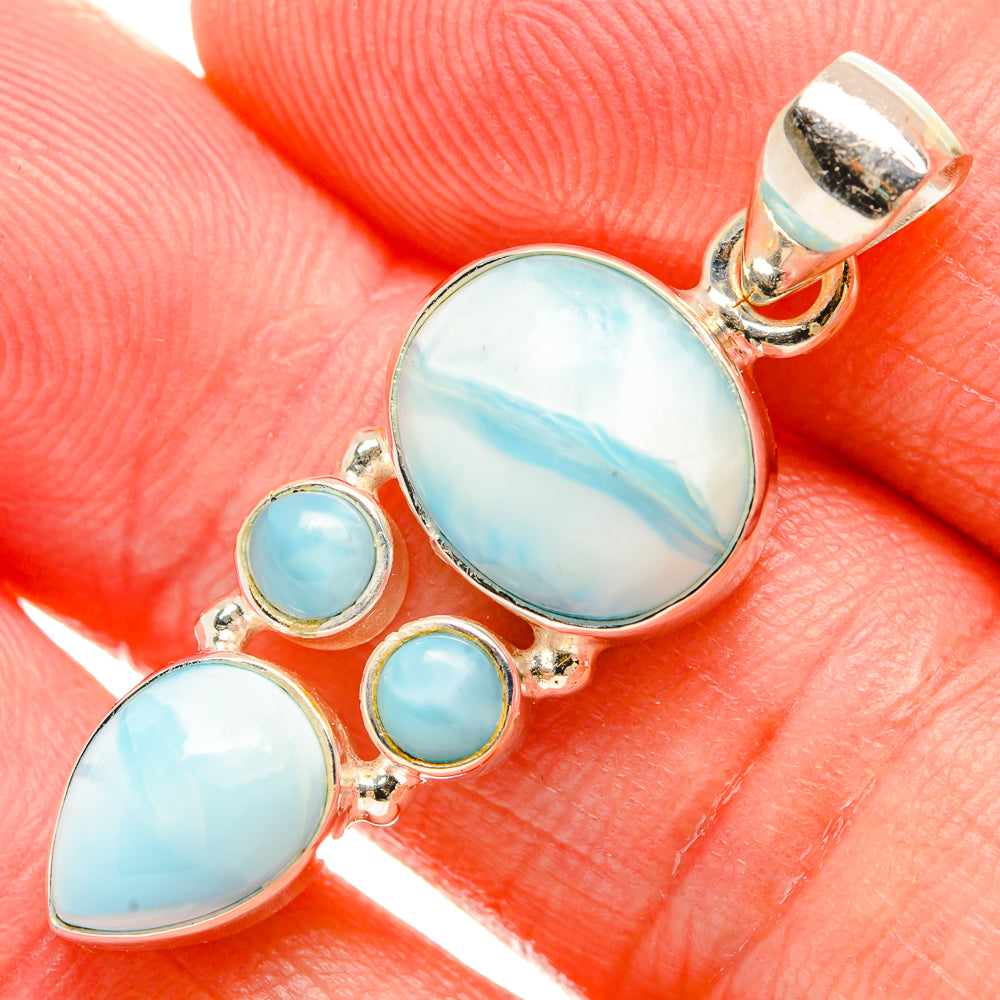 Larimar pendant with large oval and three small blue larimar stones in silver setting