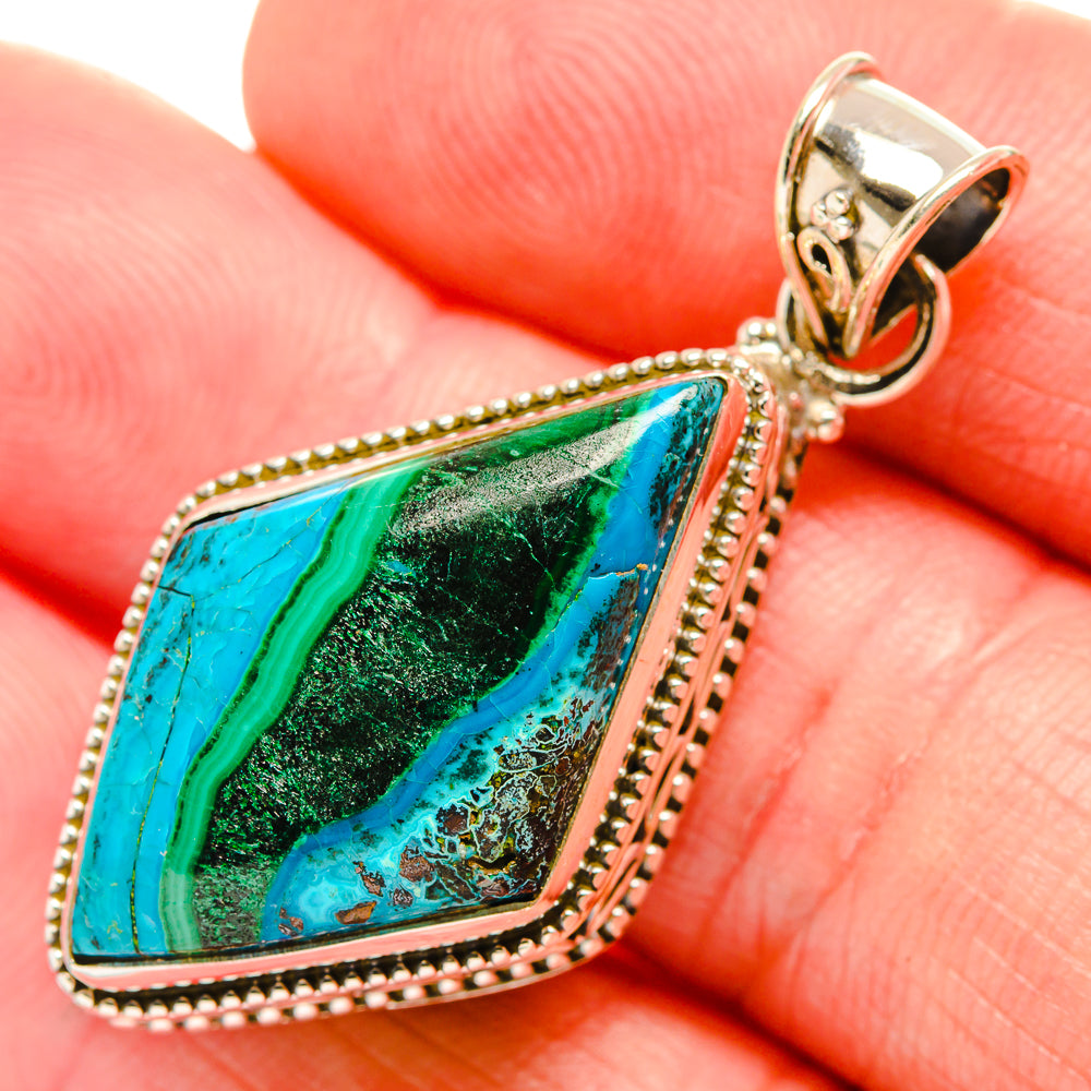Chrysocolla and malachite pendant bail closeup, blue and green stone in silver frame