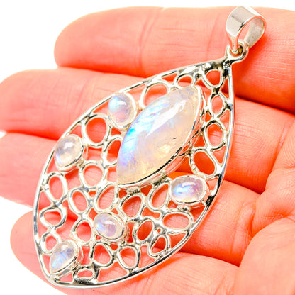 925 sterling silver teardrop pendant with filigree and iridescent moonstone-like stones