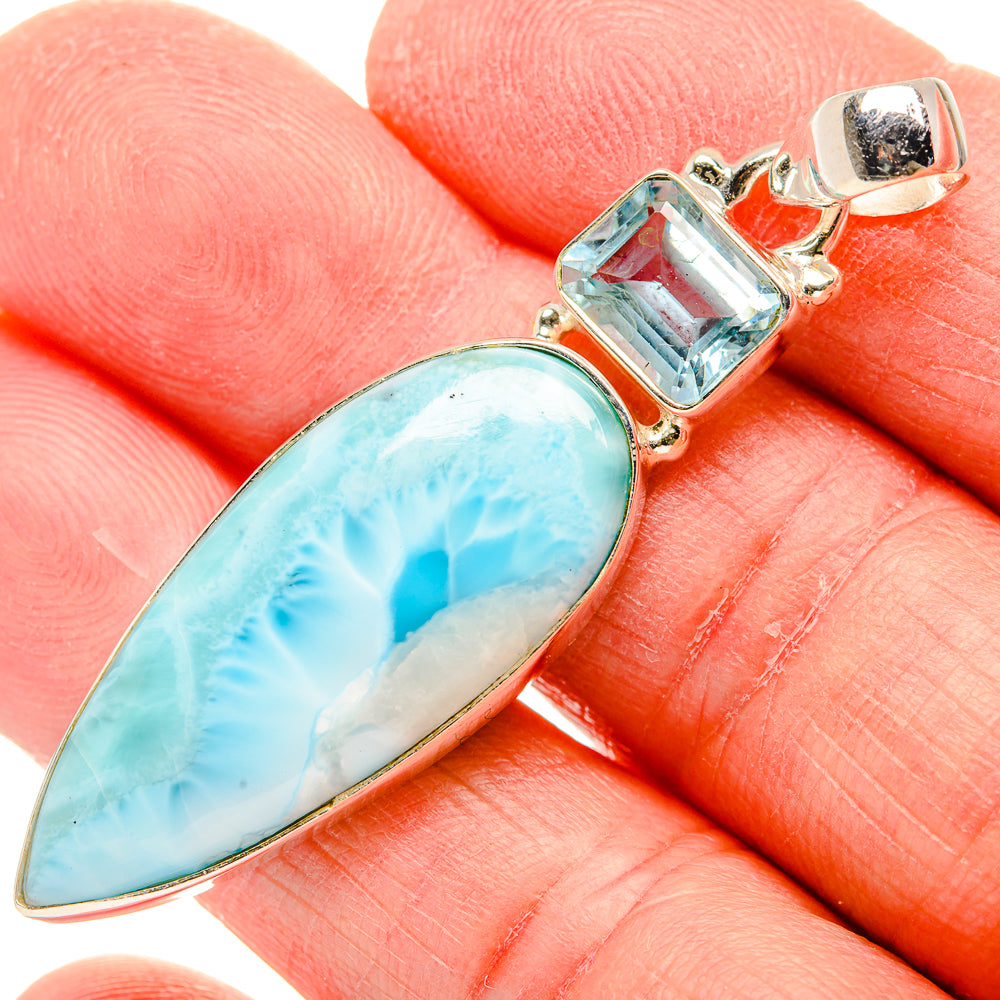 Blue larimar teardrop pendant with square blue topaz bezel in 925 silver setting