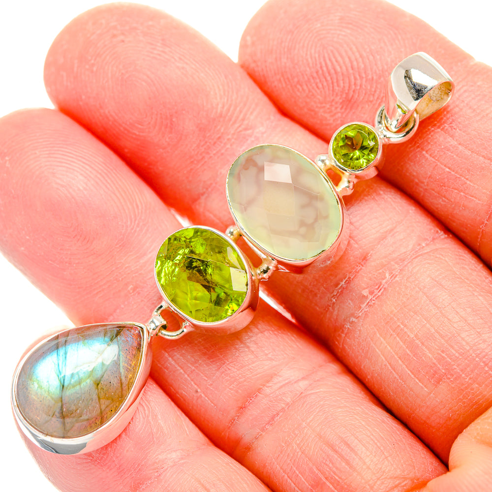 Sterling silver pendant with three bezel-set round gemstones: peridot, prehnite, labradorite