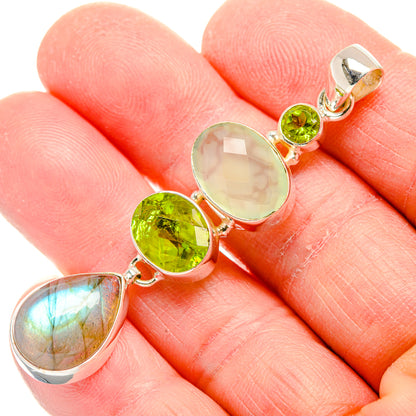 Sterling silver pendant with three bezel-set round gemstones: peridot, prehnite, labradorite