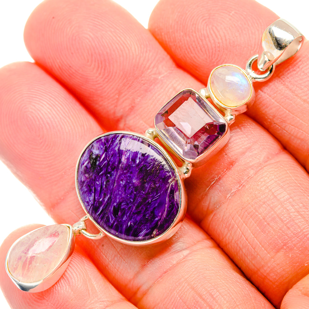 Sterling silver pendant with purple charoite circle and opal teardrops