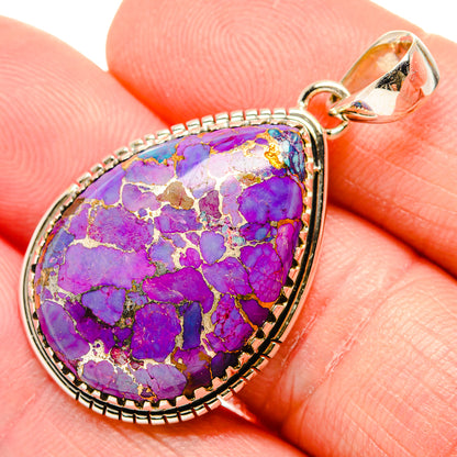 Purple turquoise teardrop pendant detail with sterling silver frame and bail loop