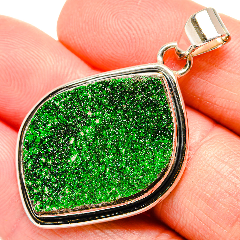 Close-up green druzy pendant in 925 sterling silver teardrop bezel with bail