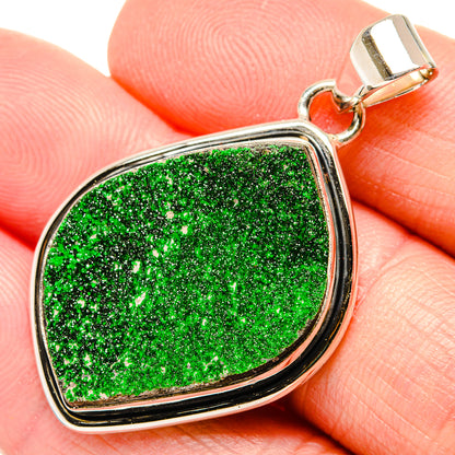 Close-up green druzy pendant in 925 sterling silver teardrop bezel with bail