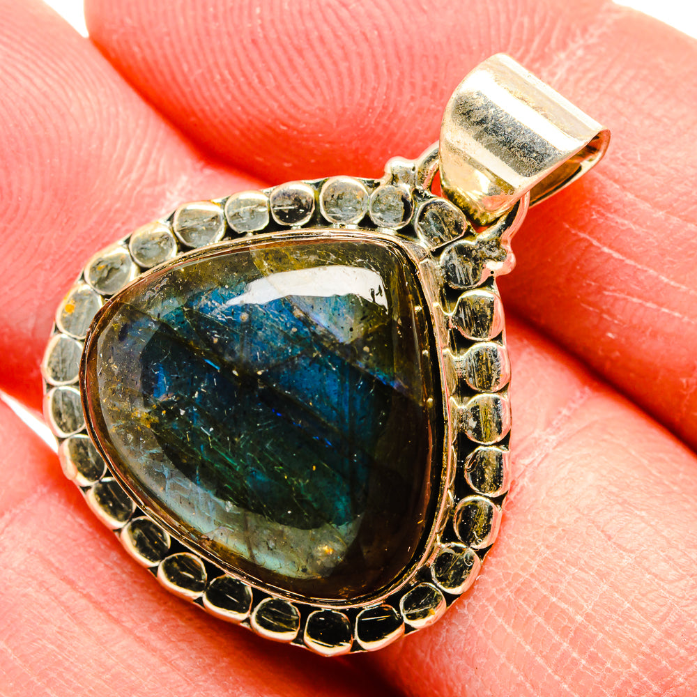 925 sterling silver labradorite pendant with blue-green oval cabochon and beaded bezel