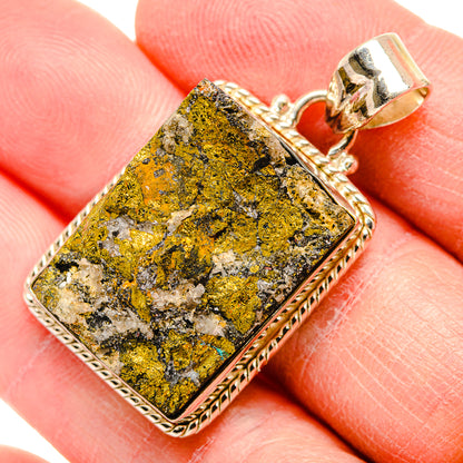 Rough pyrite gemstone pendant in square sterling silver frame with bail