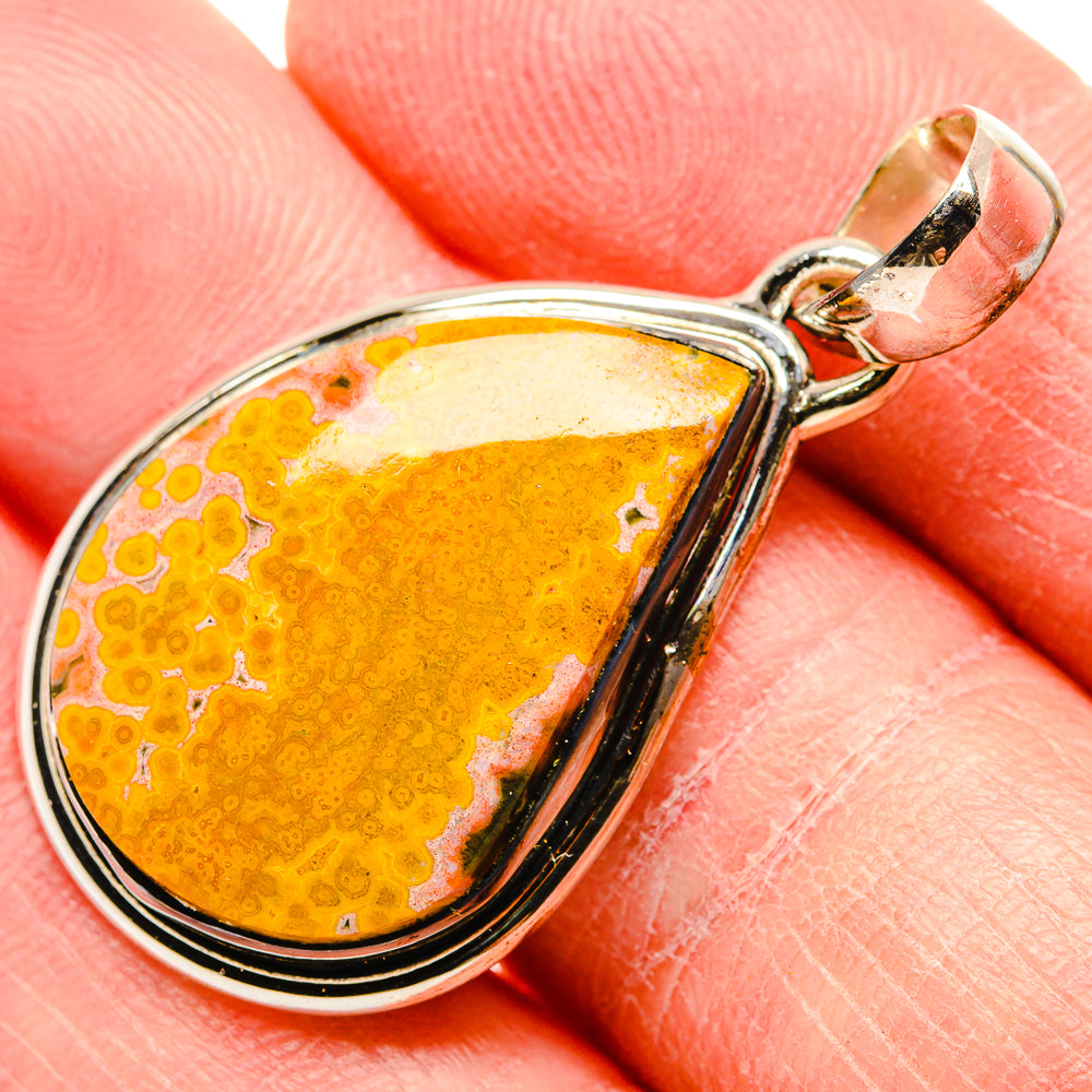 Ocean jasper teardrop pendant in 925 sterling silver, bail detail with orange speckled stone
