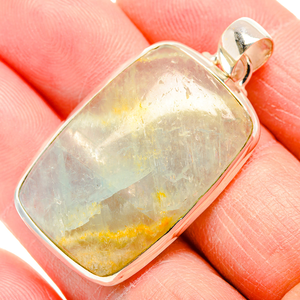 Cushion-cut natural aquamarine stone pendant, translucent blue-green with yellow accents