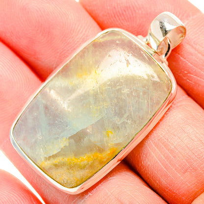 Cushion-cut natural aquamarine stone pendant, translucent blue-green with yellow accents
