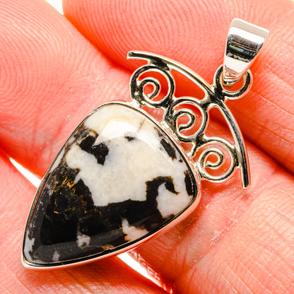 Sterling silver teardrop Pinolith jasper pendant with swirling black-and-white stone