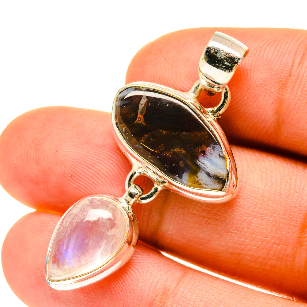 Sterling silver pendant with dark fire agate teardrop top and opalescent moonstone oval