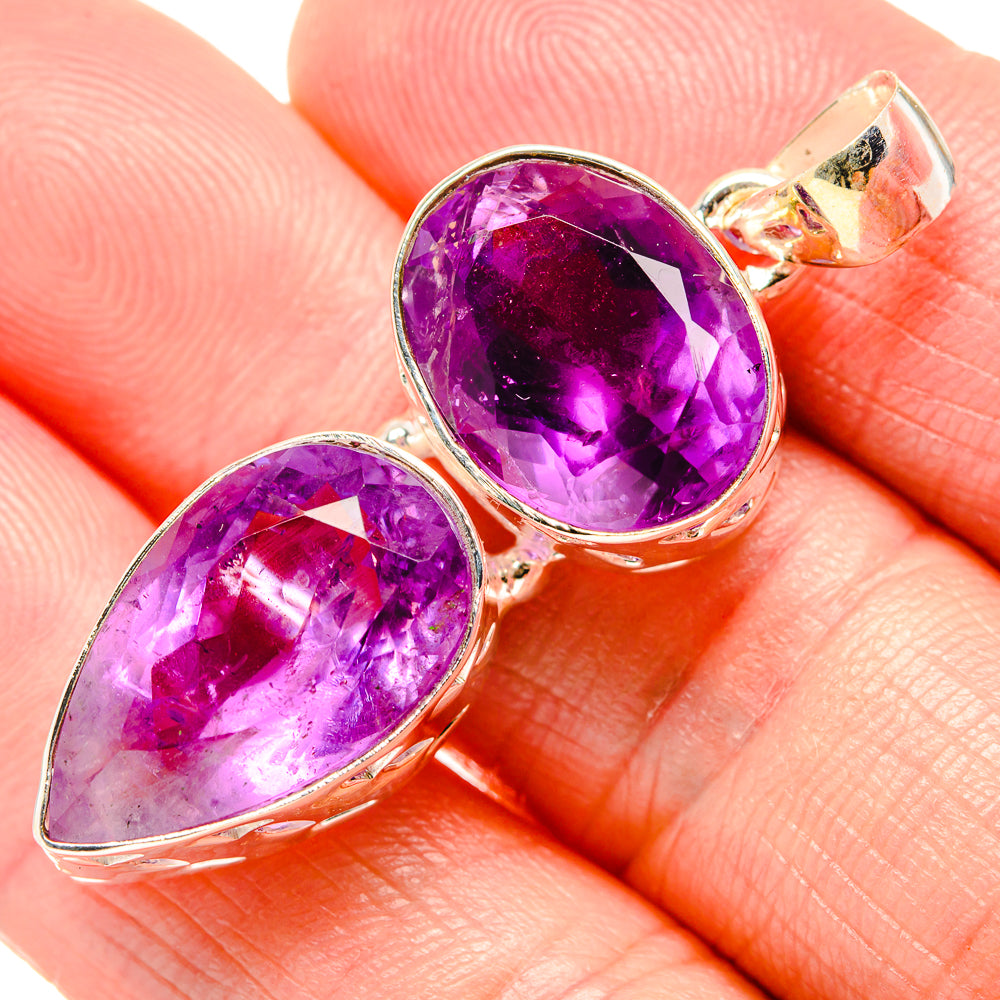 Amethyst pendant with two faceted teardrop stones in polished 925 silver setting