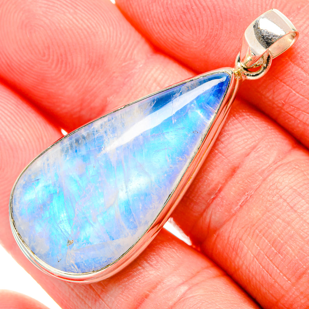 Teardrop opal pendant in sterling silver with blue iridescent stone and bail