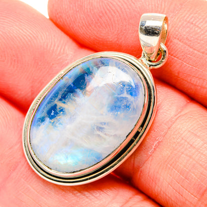 Oval rainbow moonstone pendant in 925 sterling silver bezel with bail