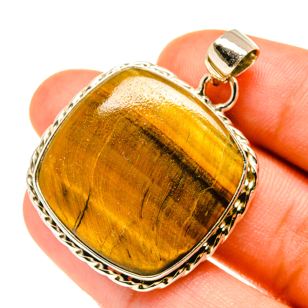 Tiger eye pendant in 925 sterling silver bezel with loop bail, golden-brown stone