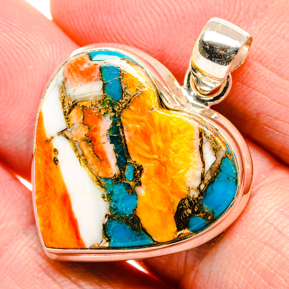 Heart-shaped spiny oyster pendant closeup with turquoise, orange, silver bail, 925 sterling