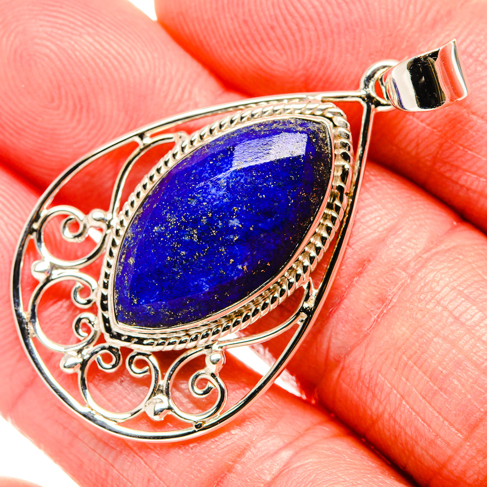 925 sterling silver lapis lazuli pendant with blue stone and ornate filigree