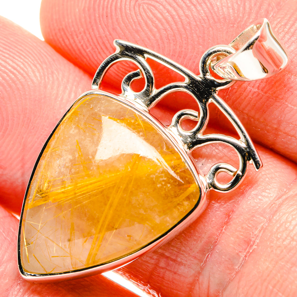 Yellow-gold rutilated quartz teardrop pendant in sterling silver with loop bail