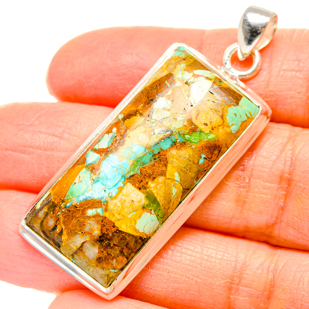 Sterling silver rectangular turquoise pendant with mottled brown and green stone