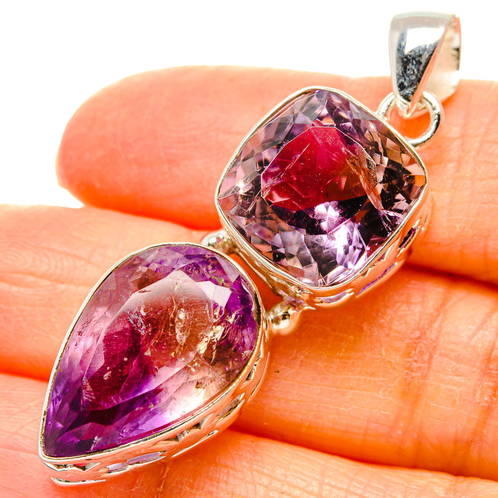 Faceted teardrop gemstone pendant in polished 925 sterling silver with purple stones