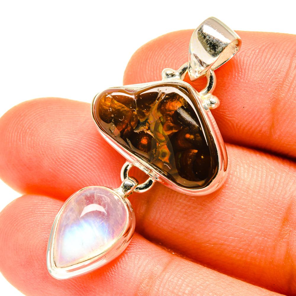 Silver-tone heart pendants with amber glass-like stone and iridescent white moonstone charm