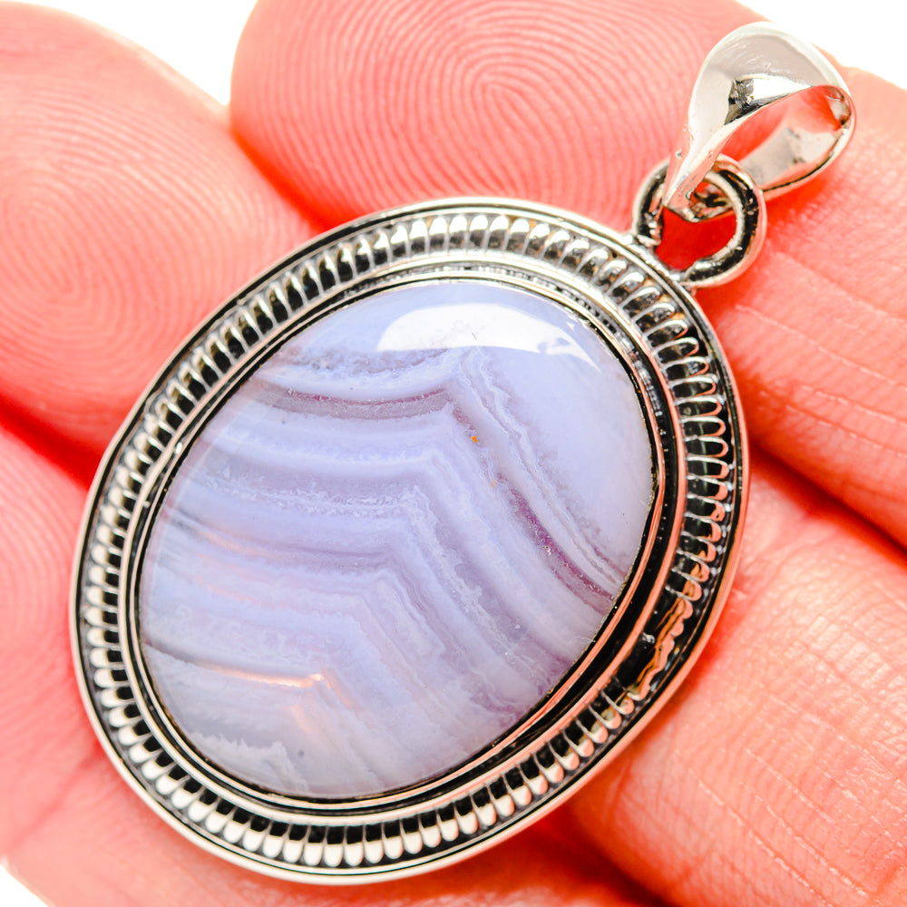 Oval blue lace agate pendant, 925 sterling silver bezel and bead border, loop bail.