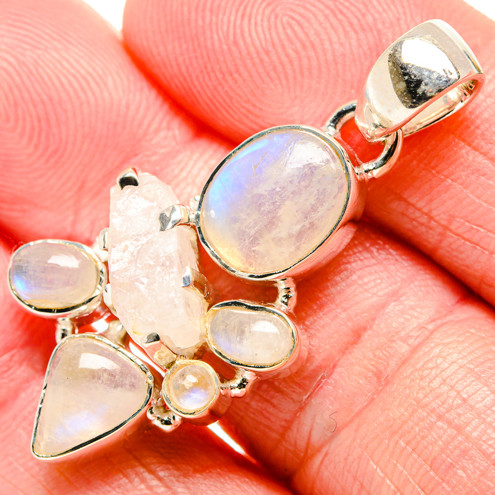 Sterling silver rainbow moonstone pendant with oval, teardrop, and round stones