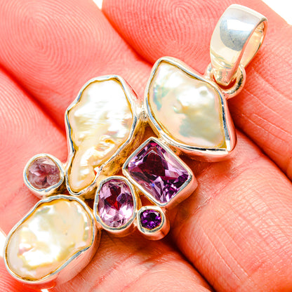 Sterling silver pendant with pearl ovals and amethyst-purple stones