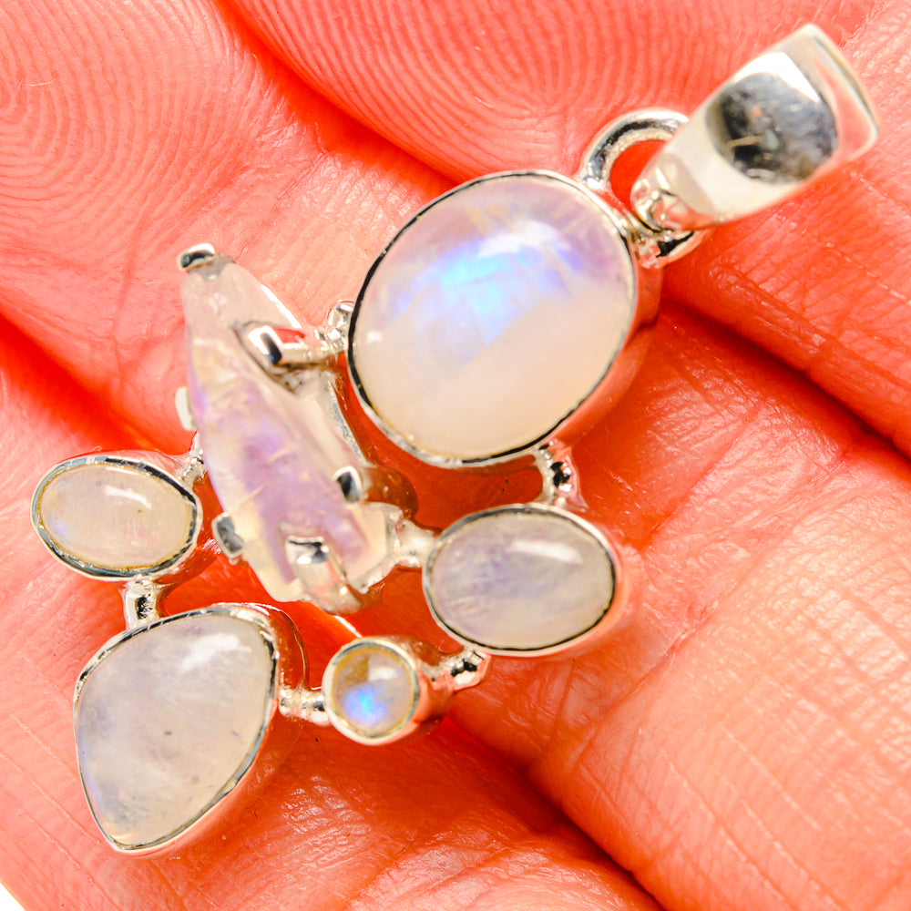 925 sterling silver moonstone pendant with central oval cabochon and small round stones