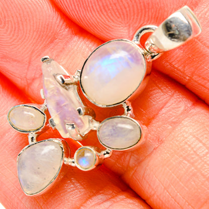 925 sterling silver moonstone pendant with central oval cabochon and small round stones