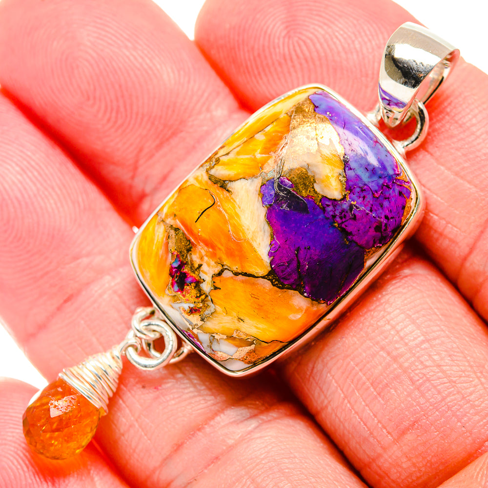 Spiny oyster pendant close-up: orange and purple stone in silver frame, 925 bail