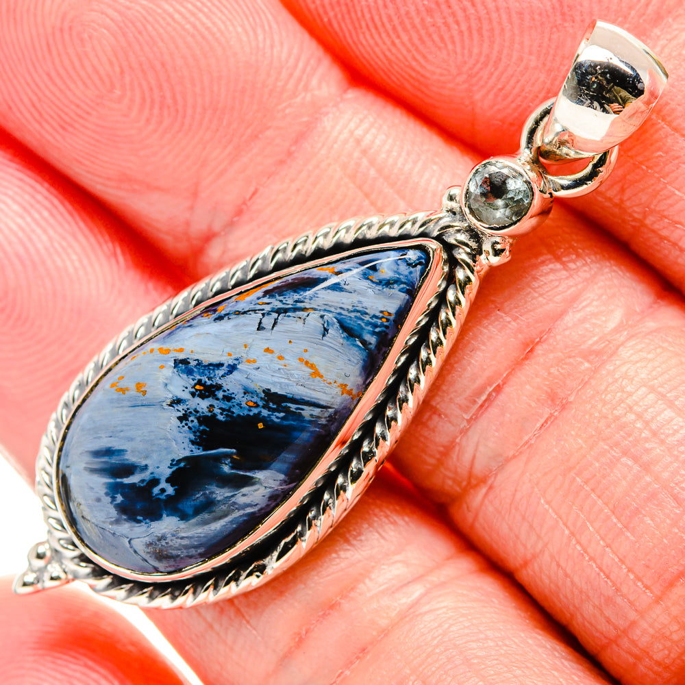 Pietersite pendant in 925 sterling silver with teardrop blue stone and braided bezel
