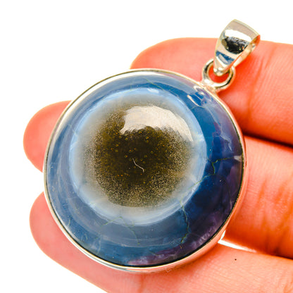Sterling silver opal pendant with round blue cabochon and open loop bail
