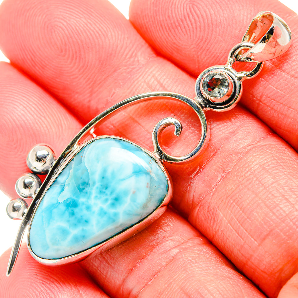Sterling silver pendant with oval sky-blue gemstone and spiral bail