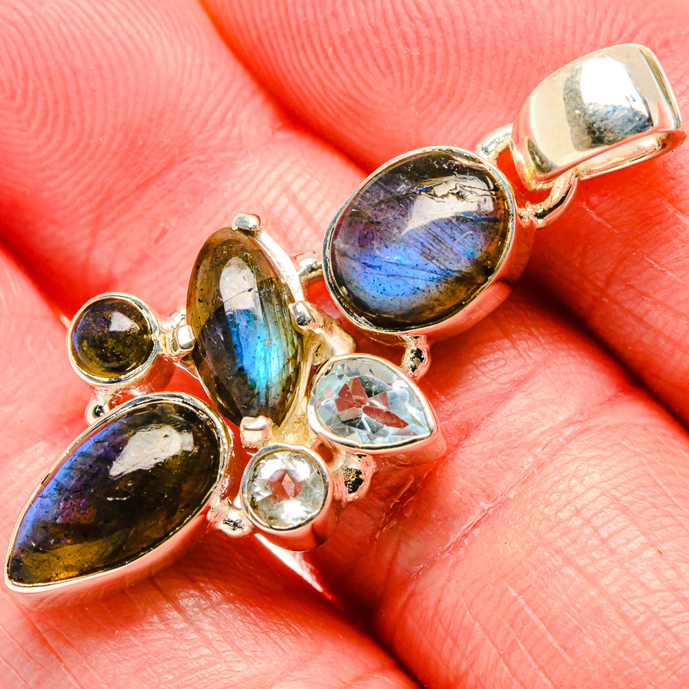 Labradorite and blue topaz sterling silver pendant with oval stones and blue flash