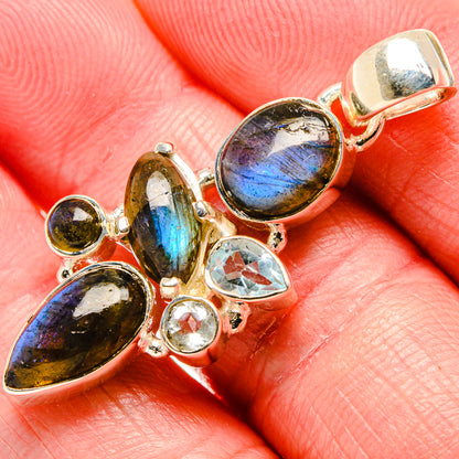 Labradorite and blue topaz sterling silver pendant with oval stones and blue flash