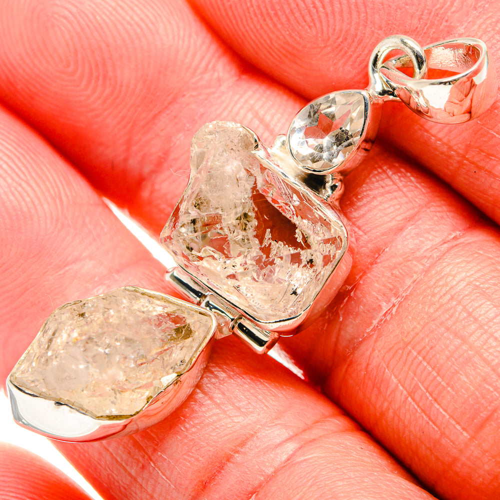 Rough white quartz pendant with two silver prong-set pieces and round bail