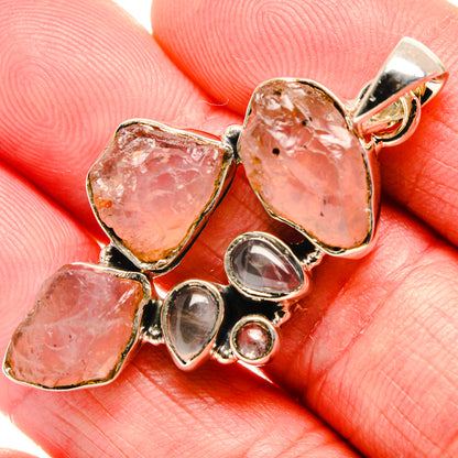 Rough rose quartz pendant with oval pink stones in polished 925 silver setting
