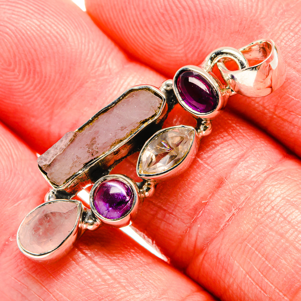 925 sterling silver pendant with amethyst and rose quartz cabochons, prong settings