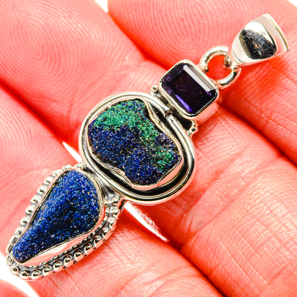 Sterling silver pendant with rough blue-green druzy oval stones and purple square gem