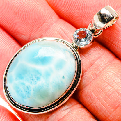 Sterling silver oval larimar pendant with round blue gemstone accent