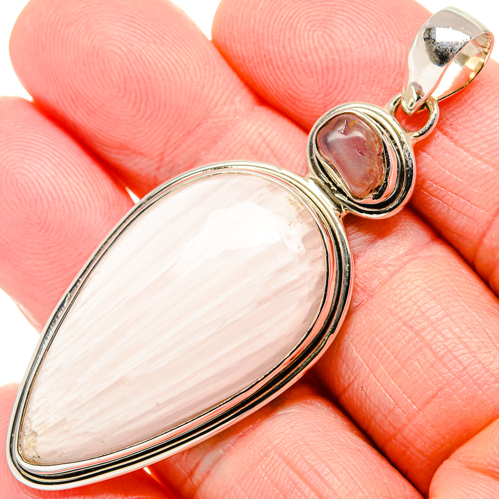 Rose quartz pendant in polished 925 sterling silver with oval white-pink gemstone, bail loop