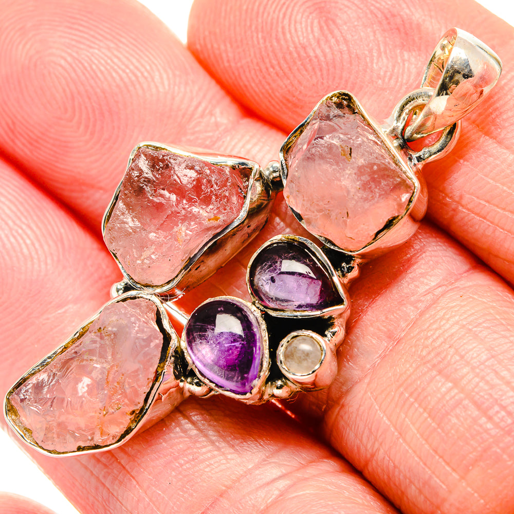 Sterling silver pendant with pink rose quartz and purple amethyst cabochons, top bail